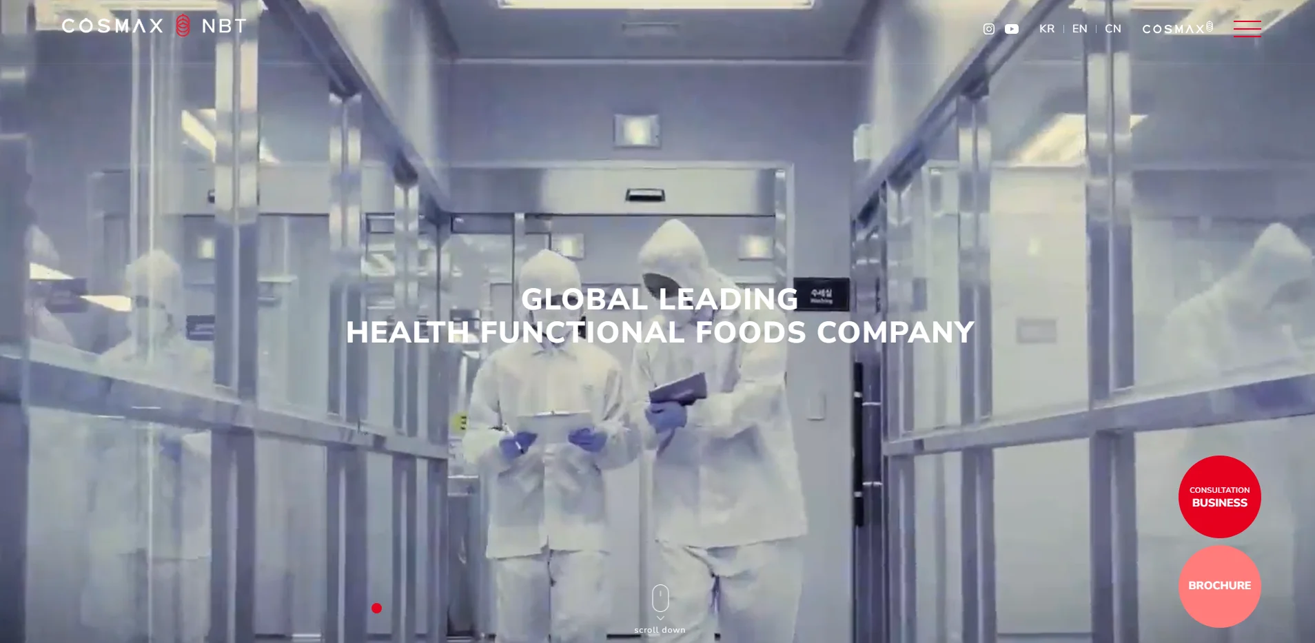 Two people in protective suits walking in a lab corridor, representing a leading health functional foods company.